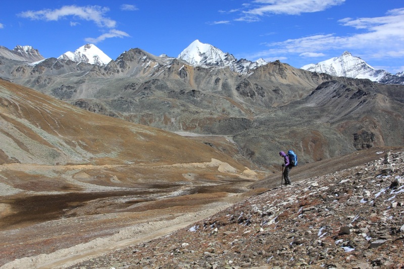 Coming down from Nyula La (5000m). Unscaled, unnamed virgin 6000m peaks in the background.